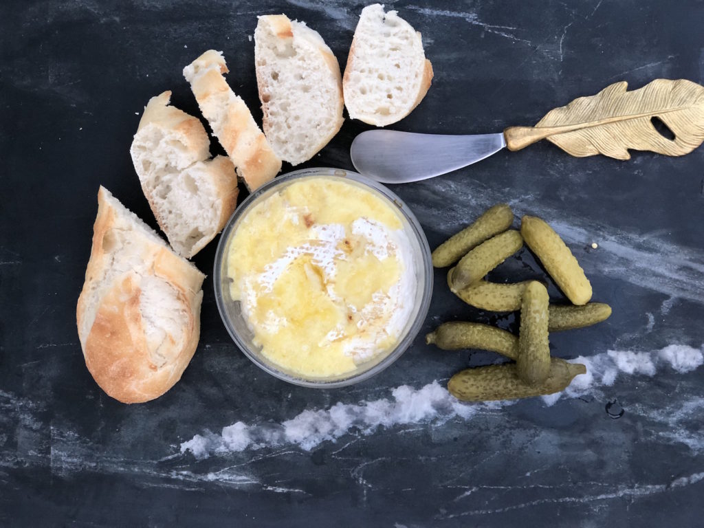 Try this garlic, cheesy appetizer recipe made with Woolly Rind, Green Dirt Farm's brie style cheese.